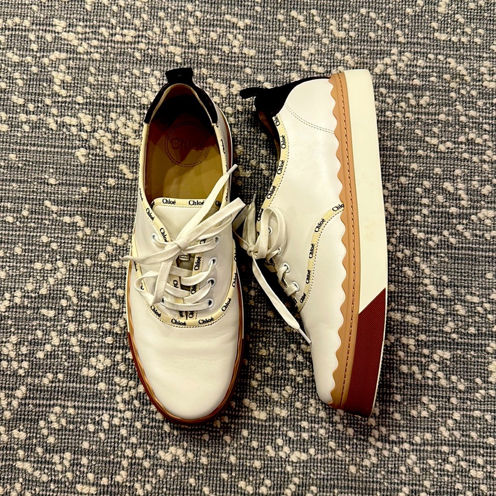 Chloe white leather sneaker with scalloped trim. Size 42.